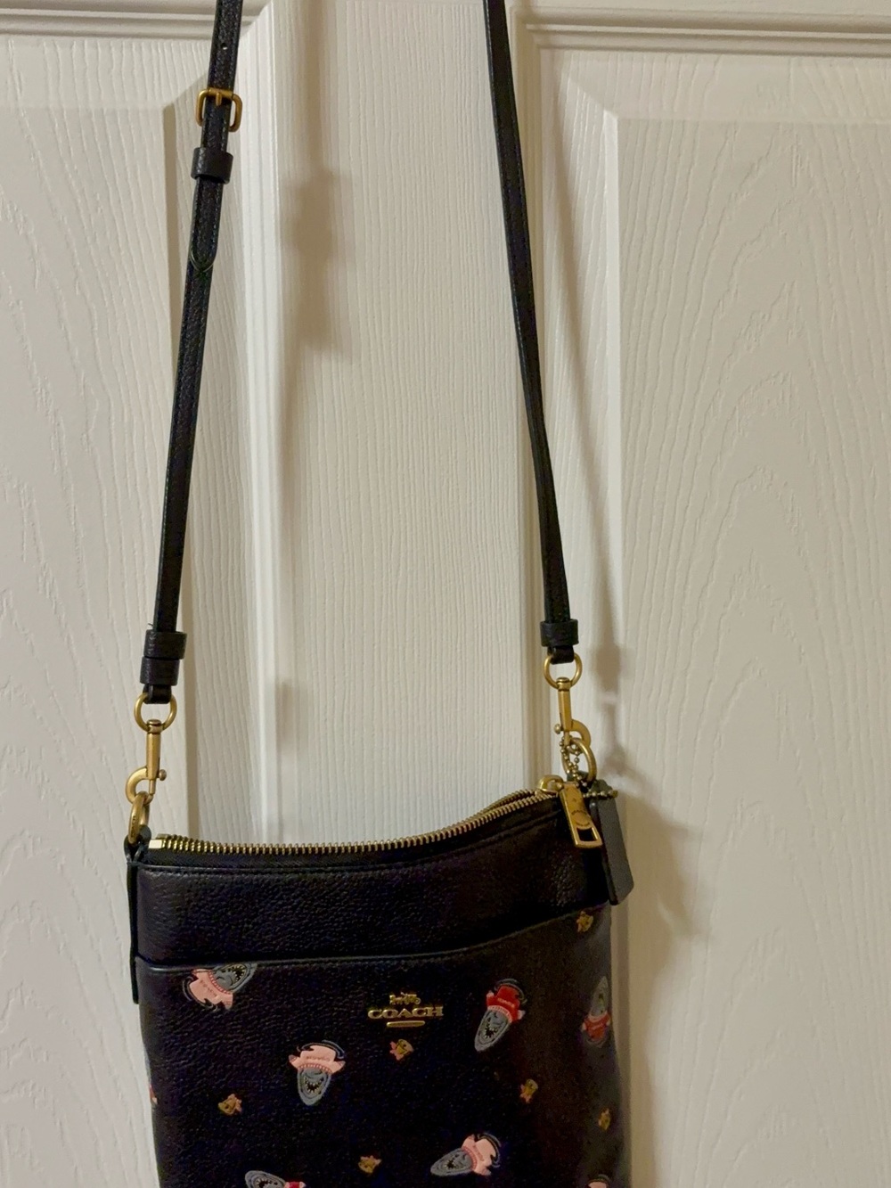 Coach Black Crossbody Pouch with Pink and Red Floral Accents